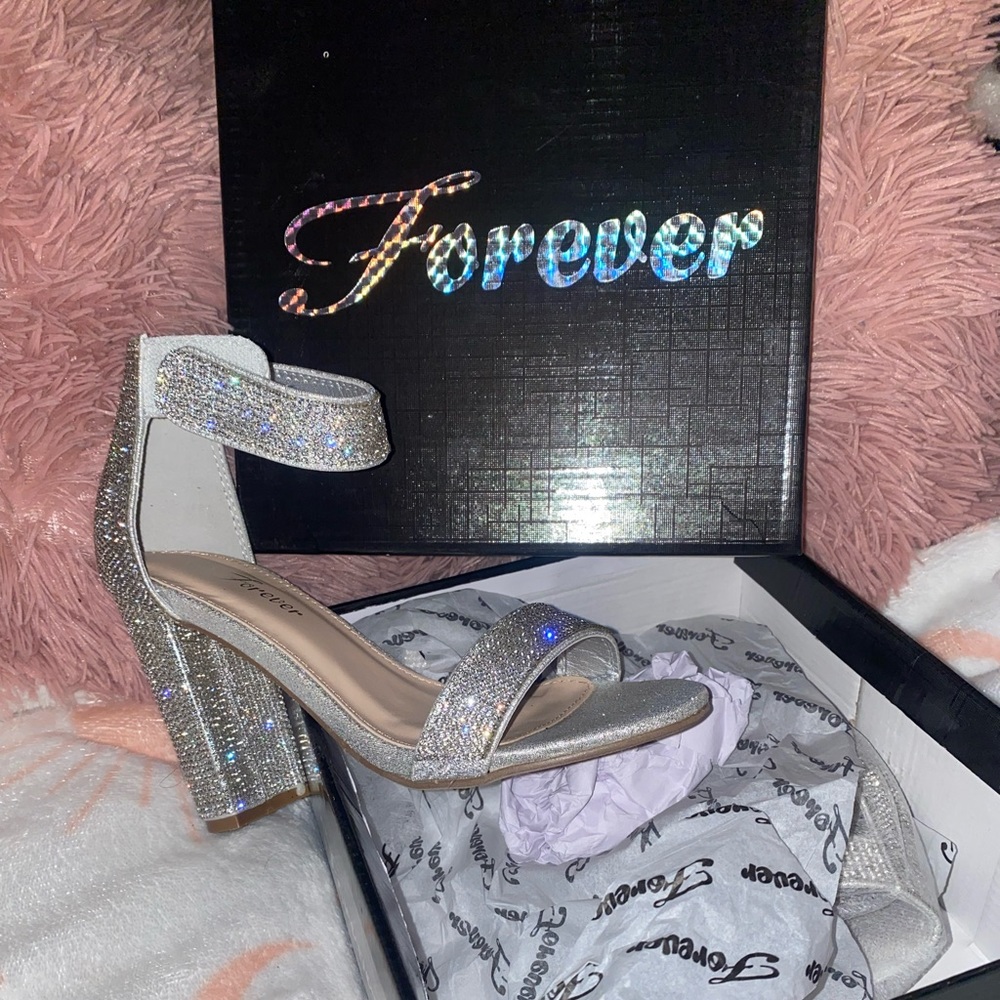 Selling these heels that were never used.